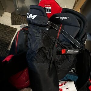CCM Junior Large Hockey Gear in Red and Black